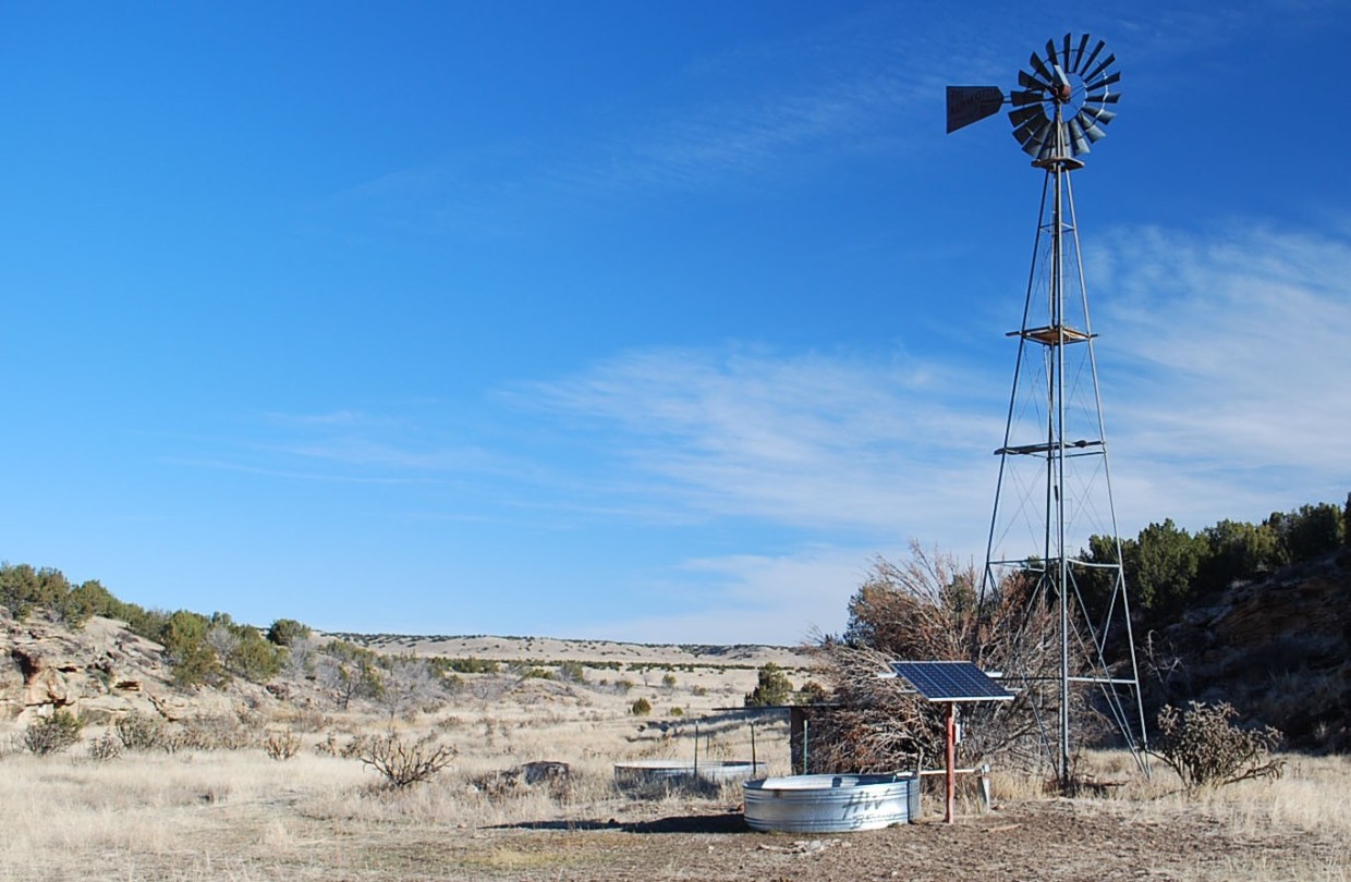 windmill and water storage at pinon canyon