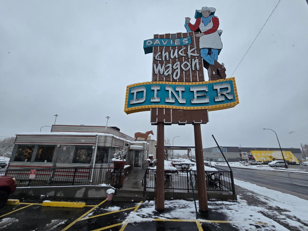 diner with a large vintage sign in front