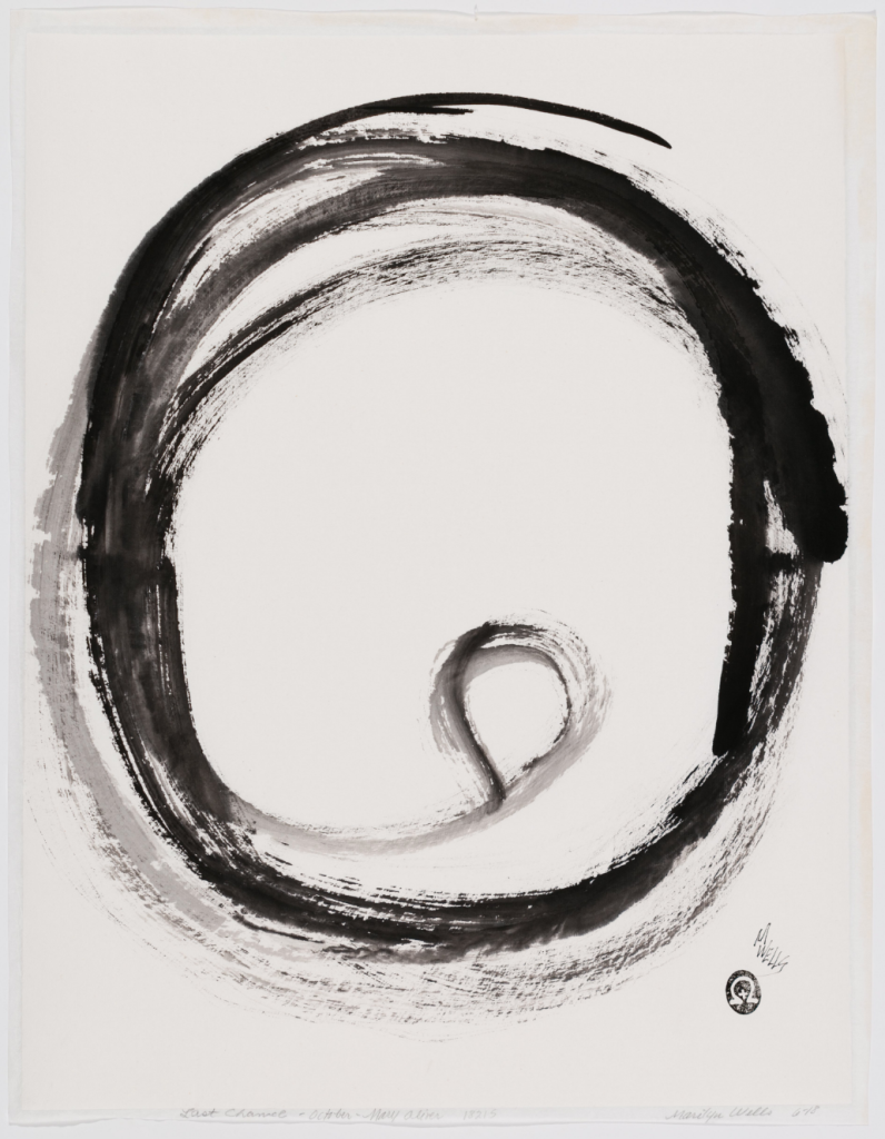A black painting of a circle