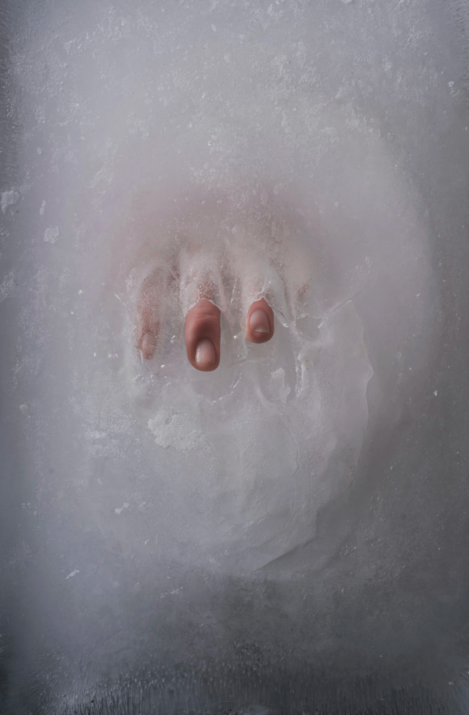 A hand in cold water