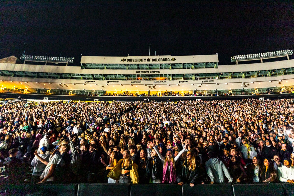 The crowd at Folsom Field at the University of Colorado Boulder for John Summit's performance.