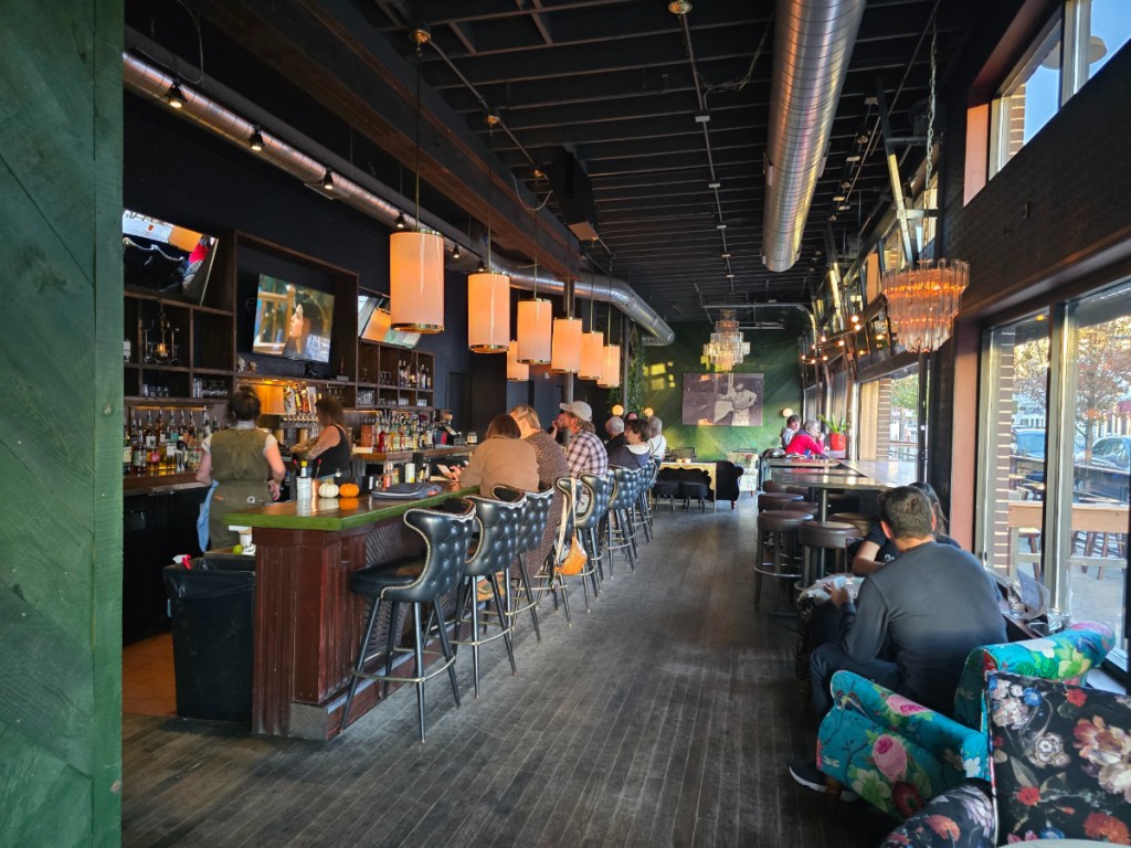 people sitting at a bar