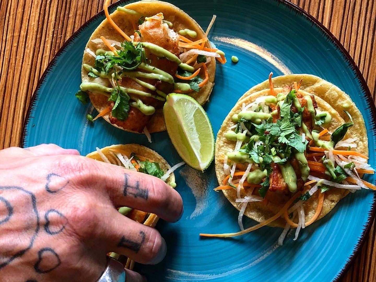 tacos on a blue plate