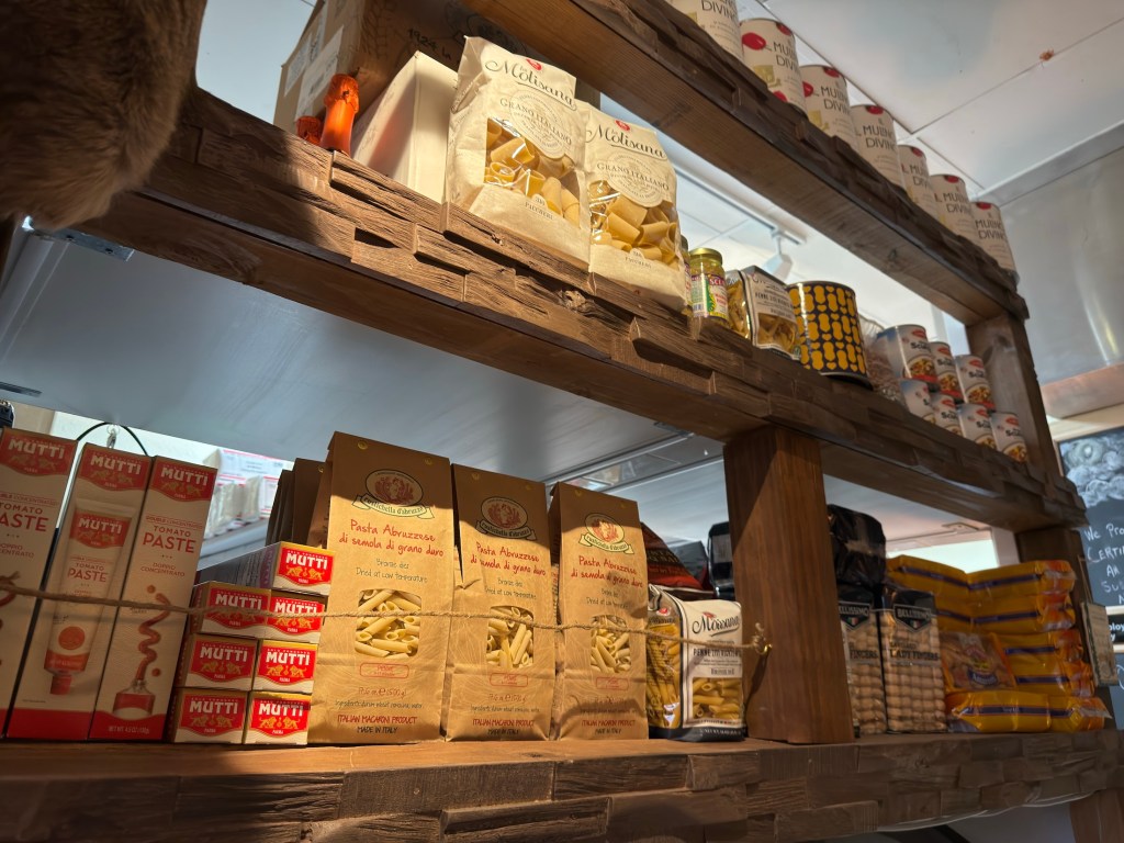 shelves with bags of dried pasta