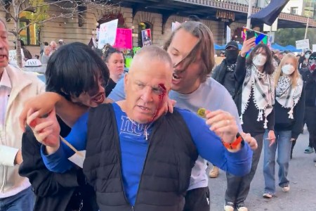 Protest Altercation Leaves Man Bloody, Booed