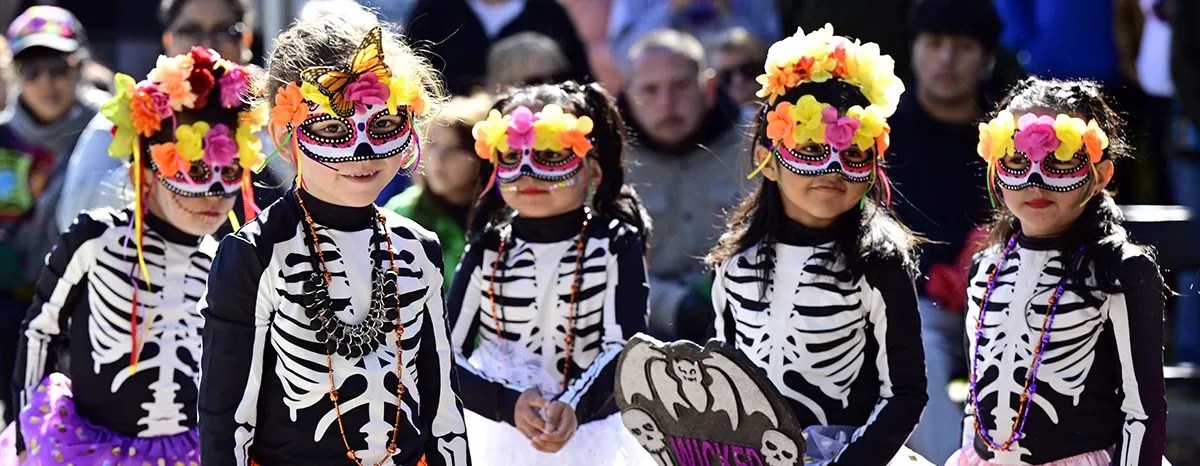 kids in day of dead costumes