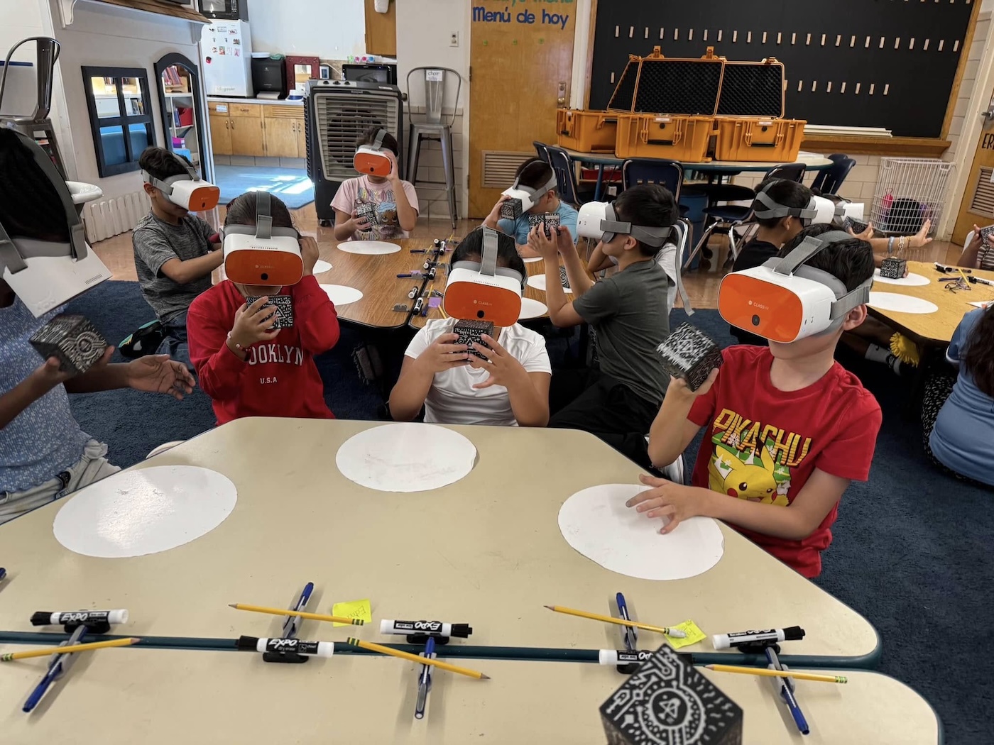 children use vr googles for a school porject