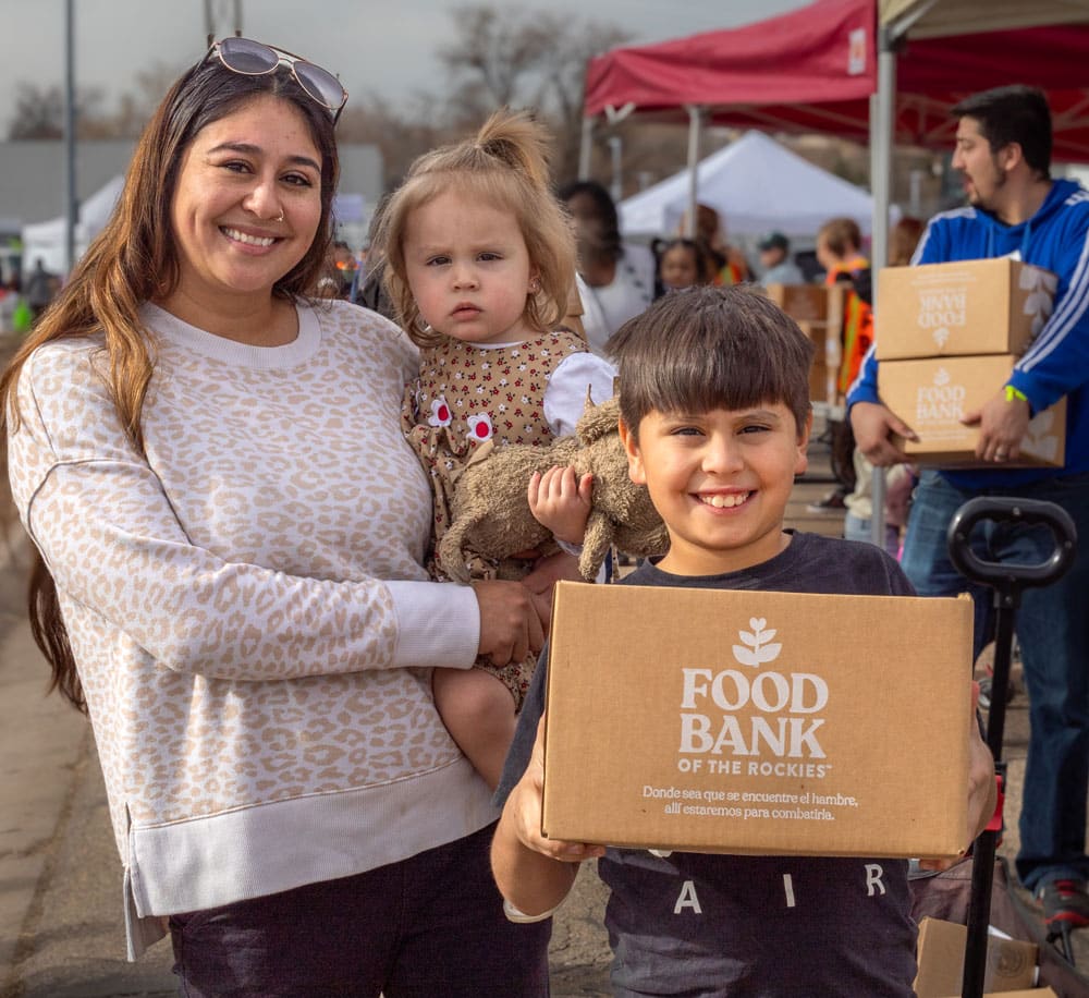 woman with children at food bank