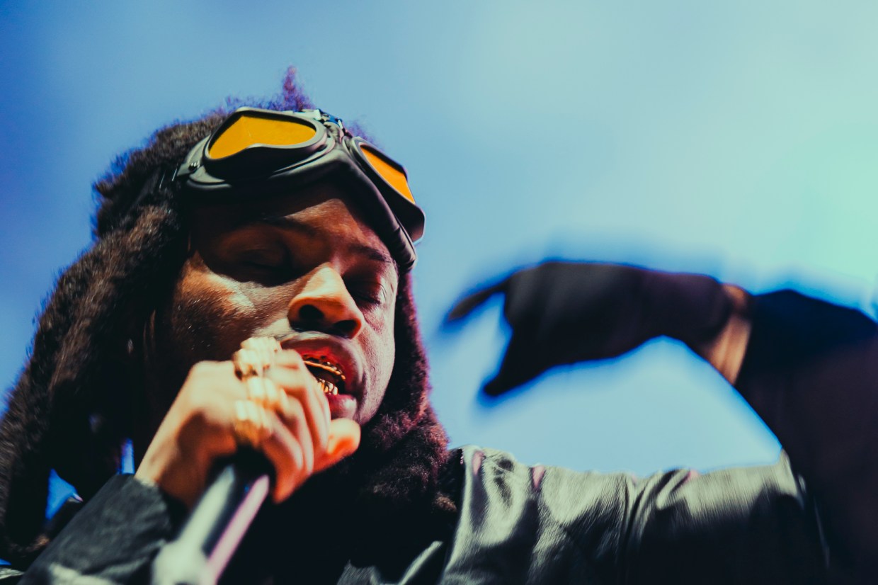 A photo showing Denzel Curry on stage at Red Rocks on October 31 for Halloween on the Rocks.