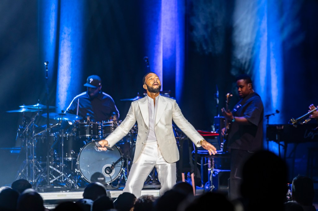 John Legend performing on stage at the Paramount Theatre on Wednesday, November 19.