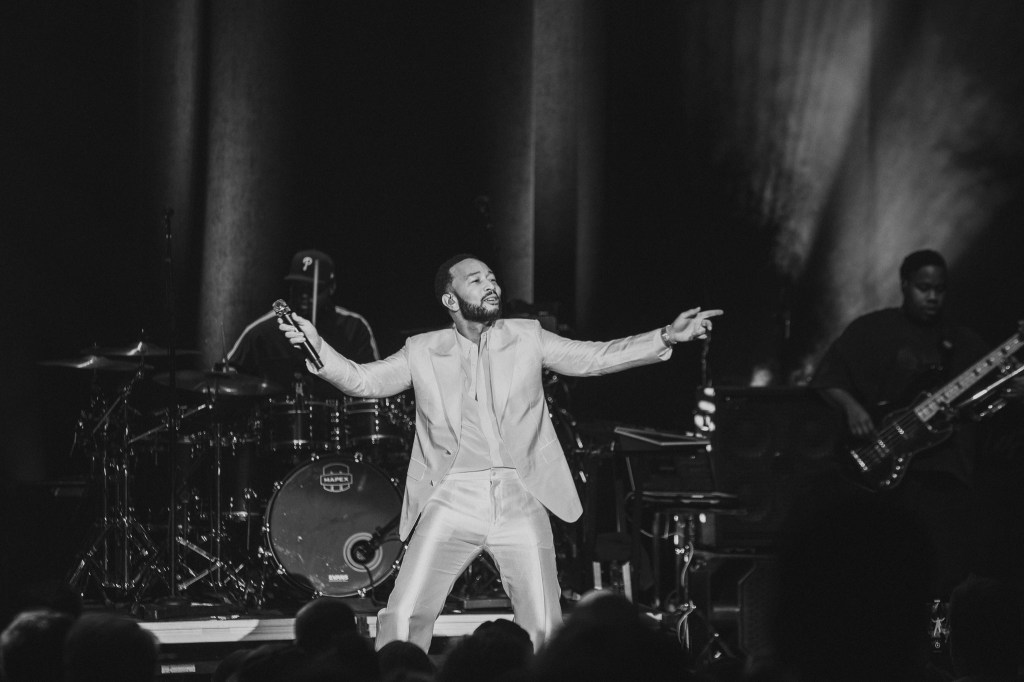 John Legend performing on stage at the Paramount Theatre on Wednesday, November 19.