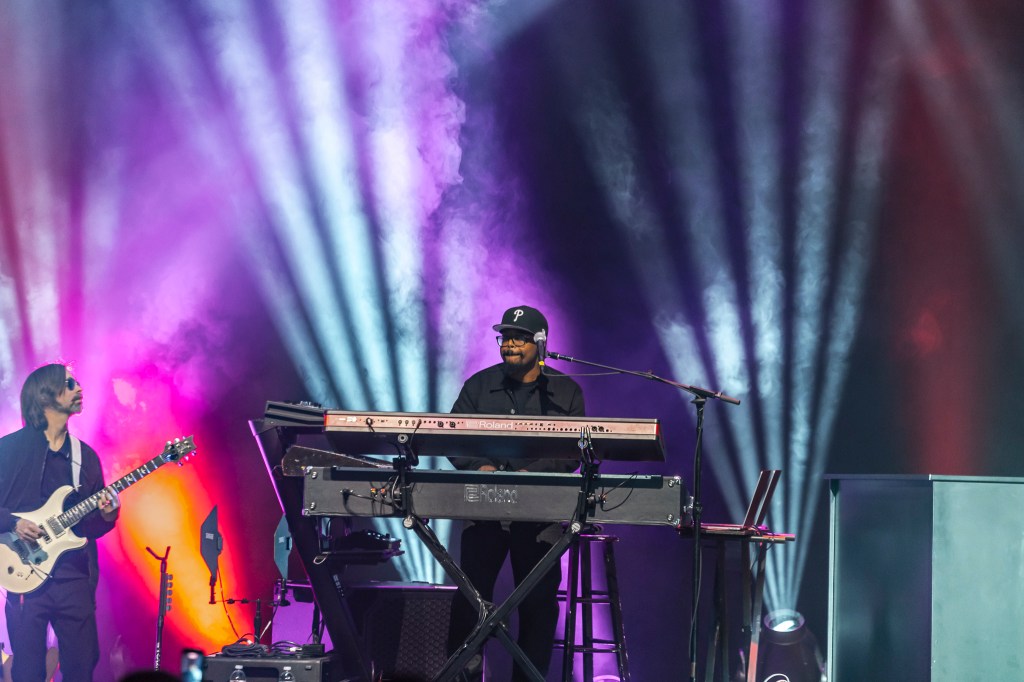 John Legend's band performing on stage at the Paramount Theatre on Wednesday, November 19.