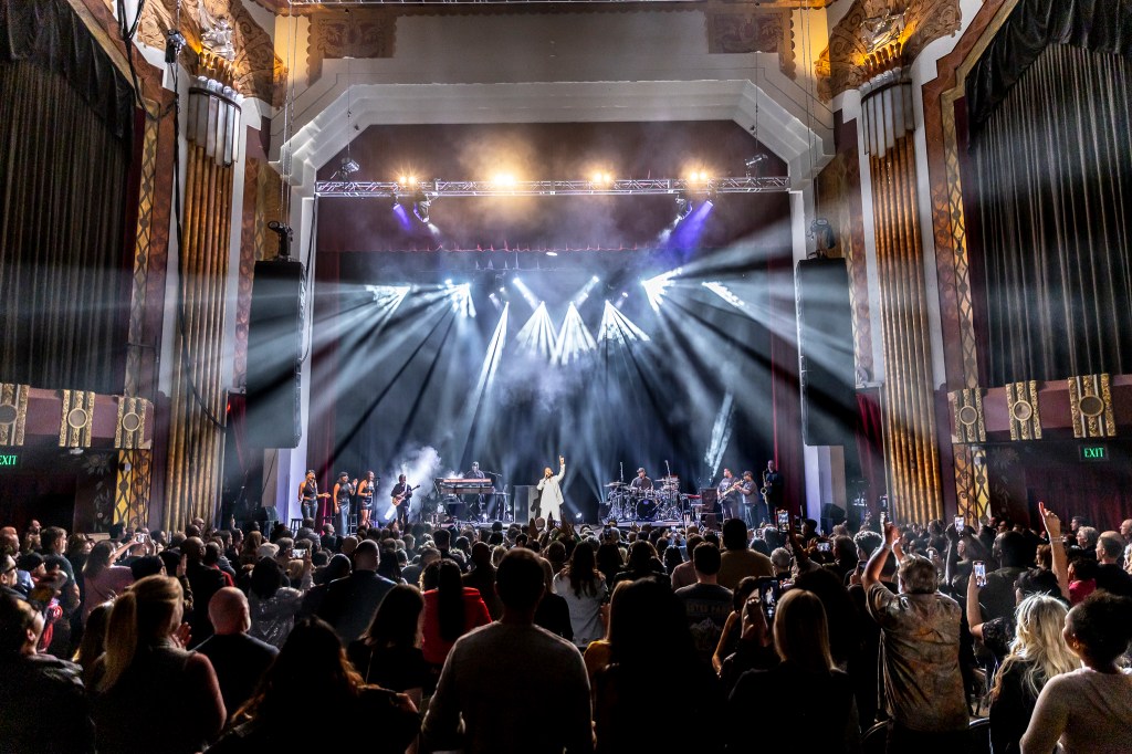 John Legend performing on stage at the Paramount Theatre on Wednesday, November 19.