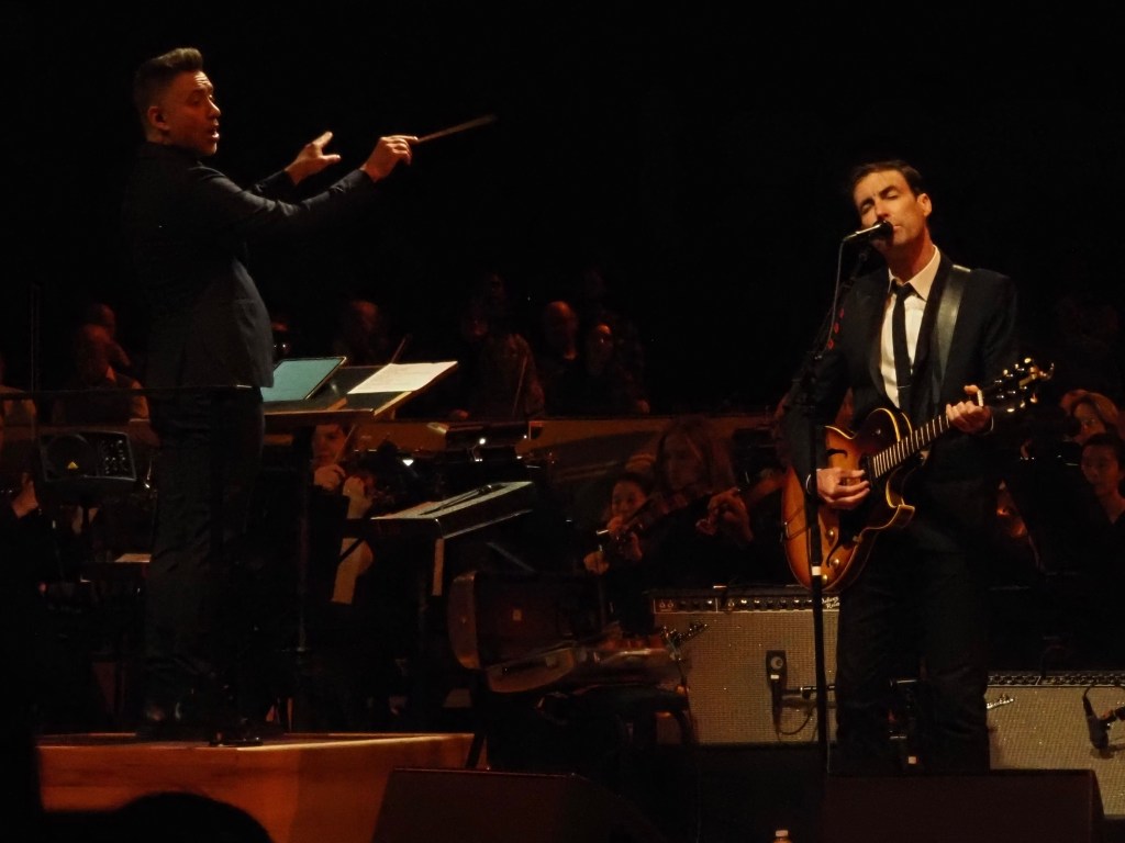Andrew Bird performs with an orchestra