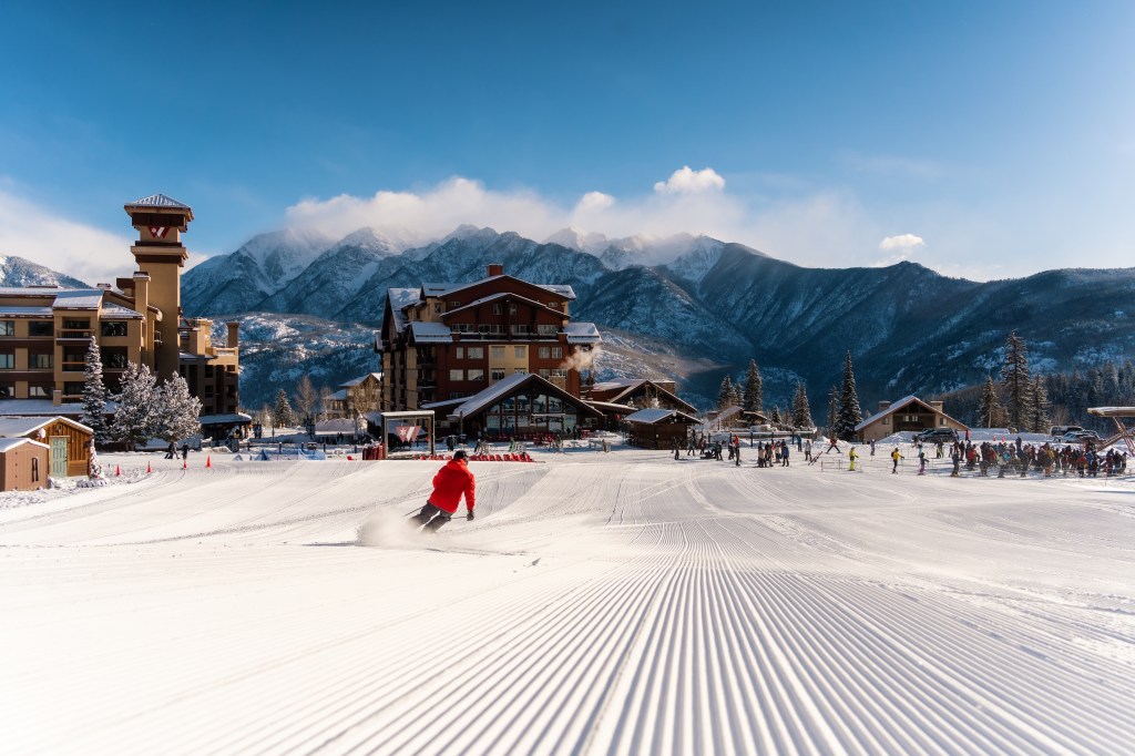 A skier on traversing fresh corduroy near the Purgatory base area