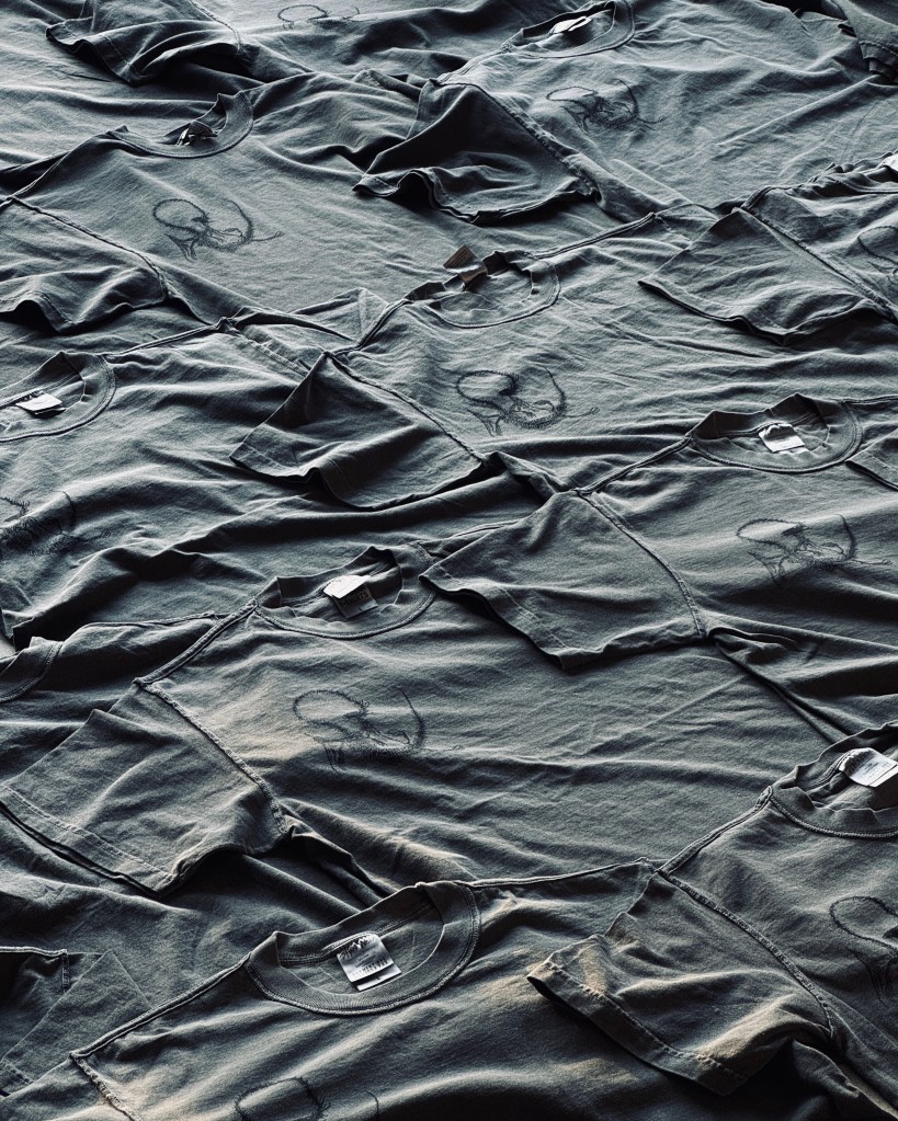 T-shirts printed with the Ryuju Collective logo.