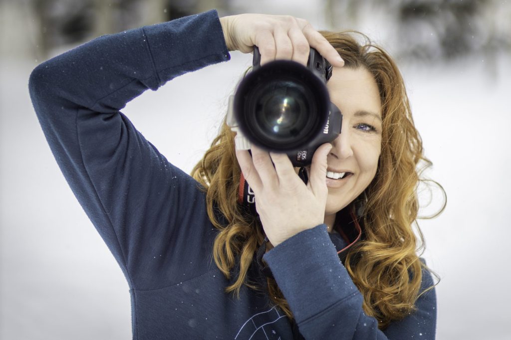 A woman with a camera
