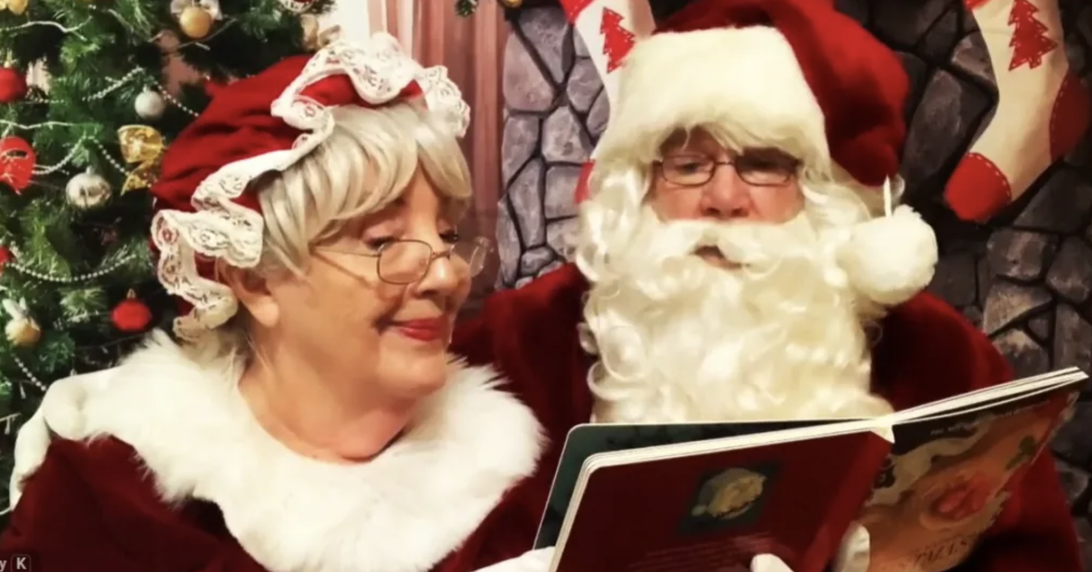 Mr. and Mrs. Claus read a book