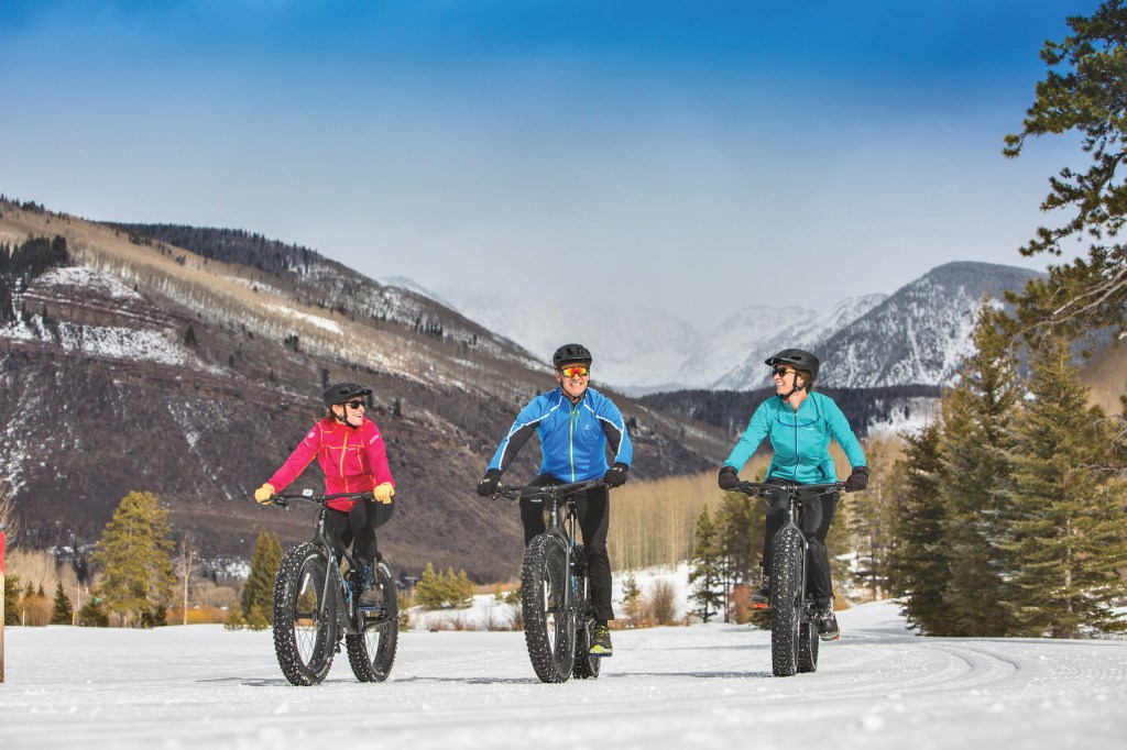 Three people fat biking at the Vail Nordic Center