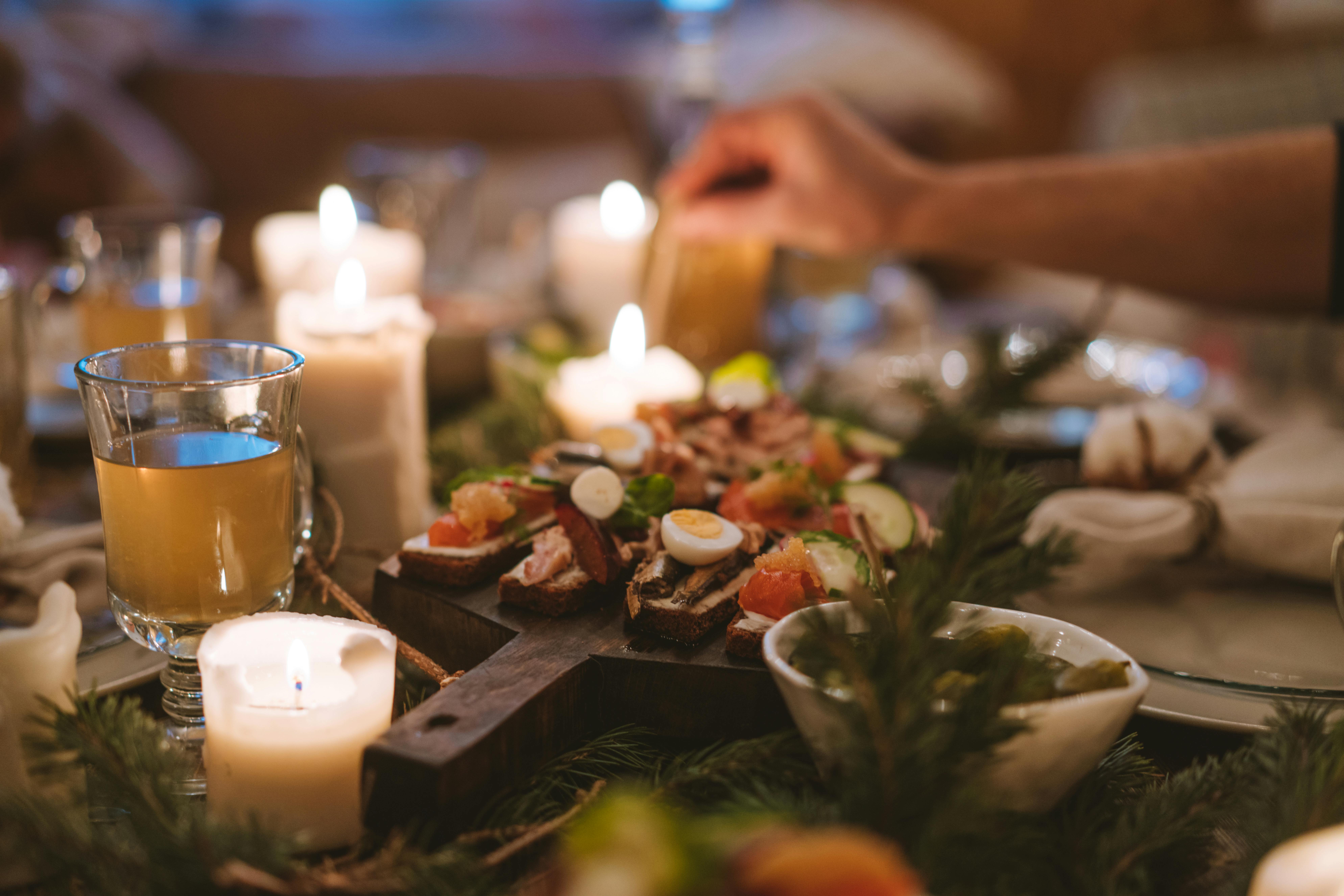 a table with candles and tea