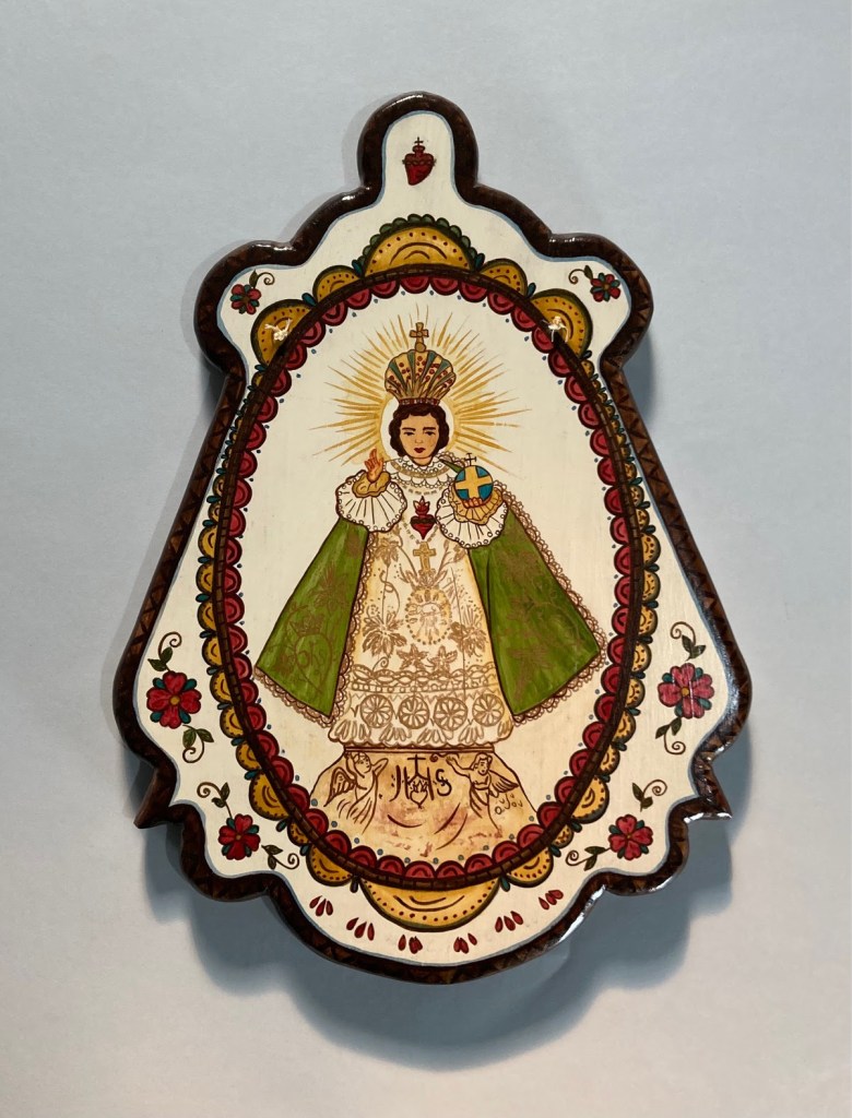 A devotional painting of a saint