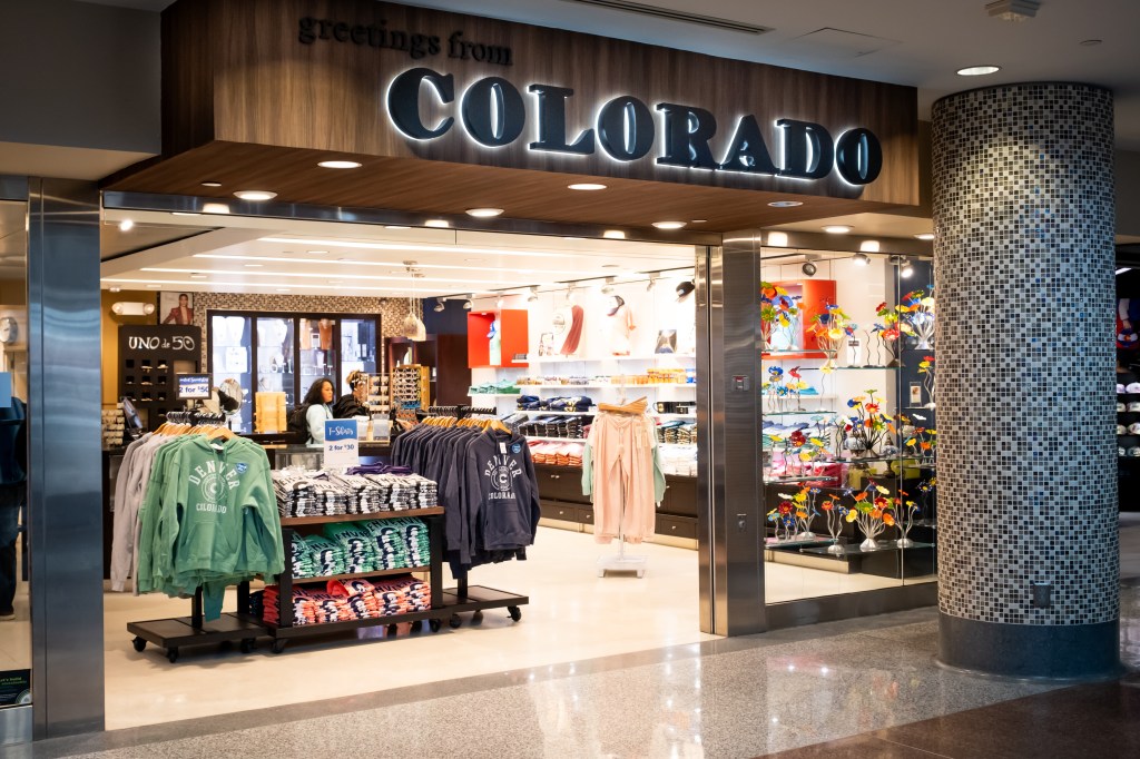 Travelers' souvenir shop at Denver International Airport with Colorado-themed merchandise.