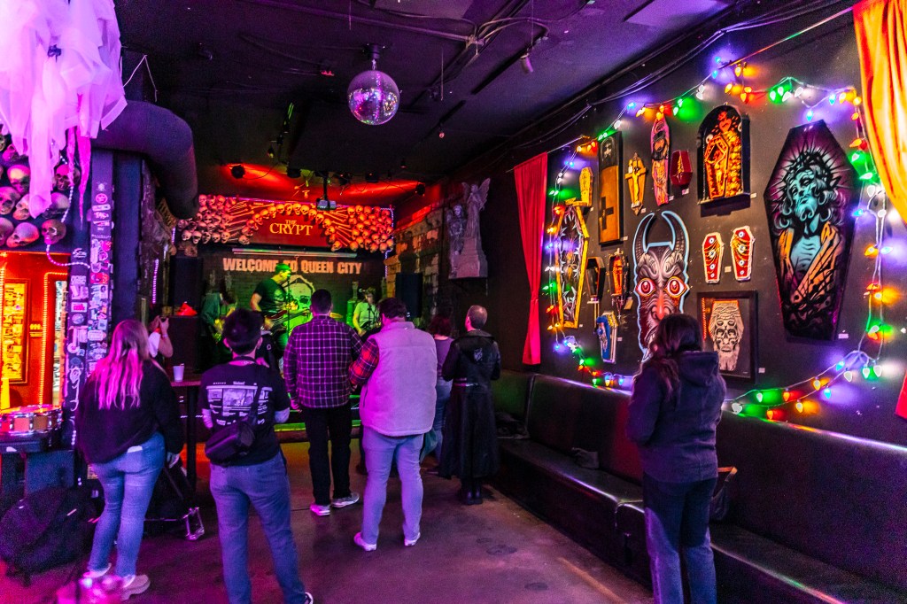 Fans watching Denver local band Broken Record at The Crypt on December 29.