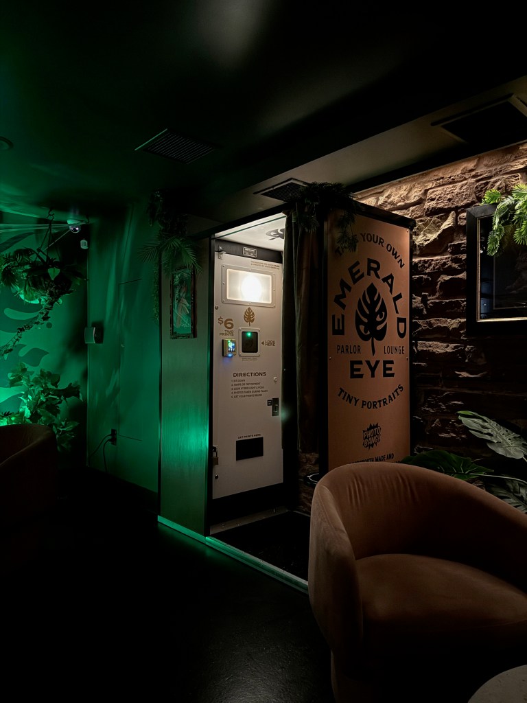 a photo booth in a jungle room