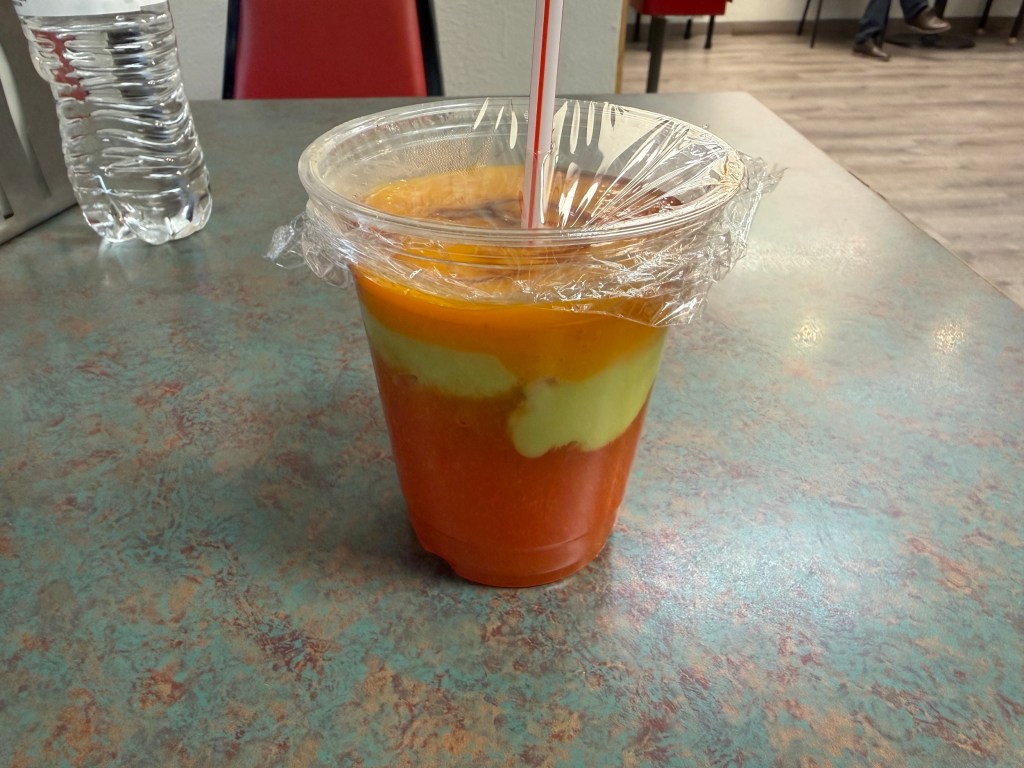 A smoothie in a plastic cup