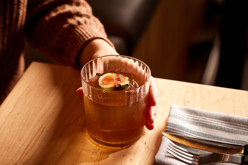 The non-alcoholic negroni from Mezcaleria Alma, garnished with fresh fig