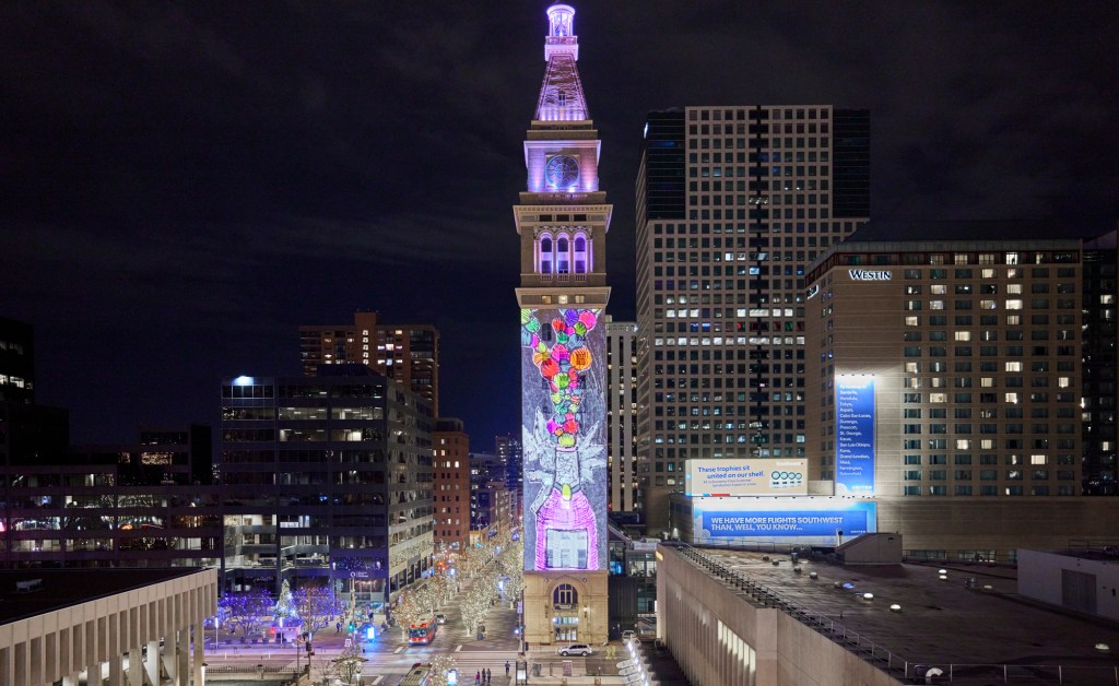 Tower with animated winter images on it.