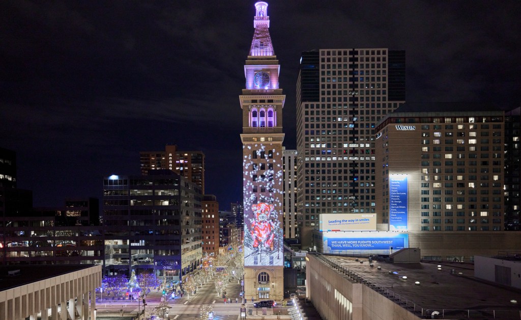Tower with animated winter images on it.