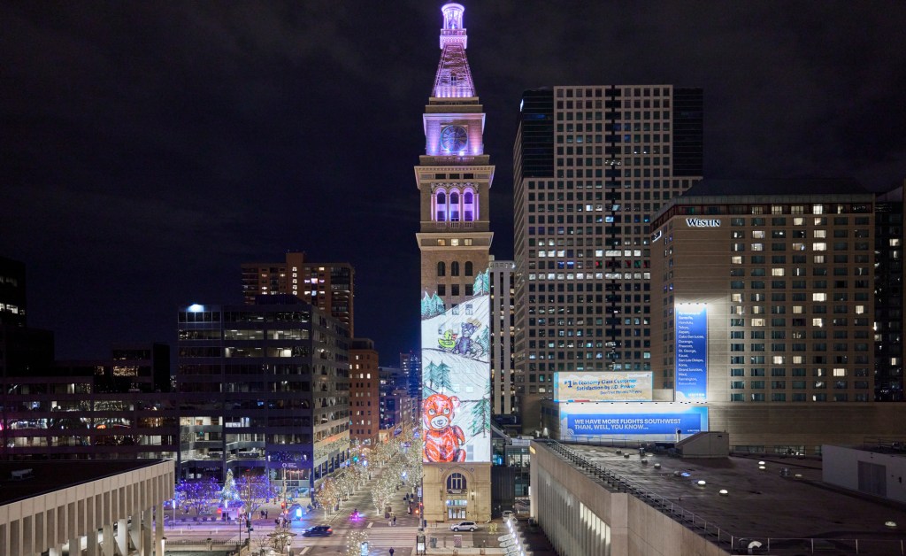 Tower with animated winter images on it.