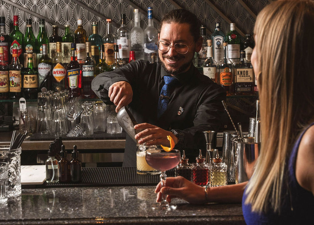 a bartender serving drinks