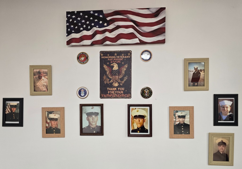 photos of veterans on a wall