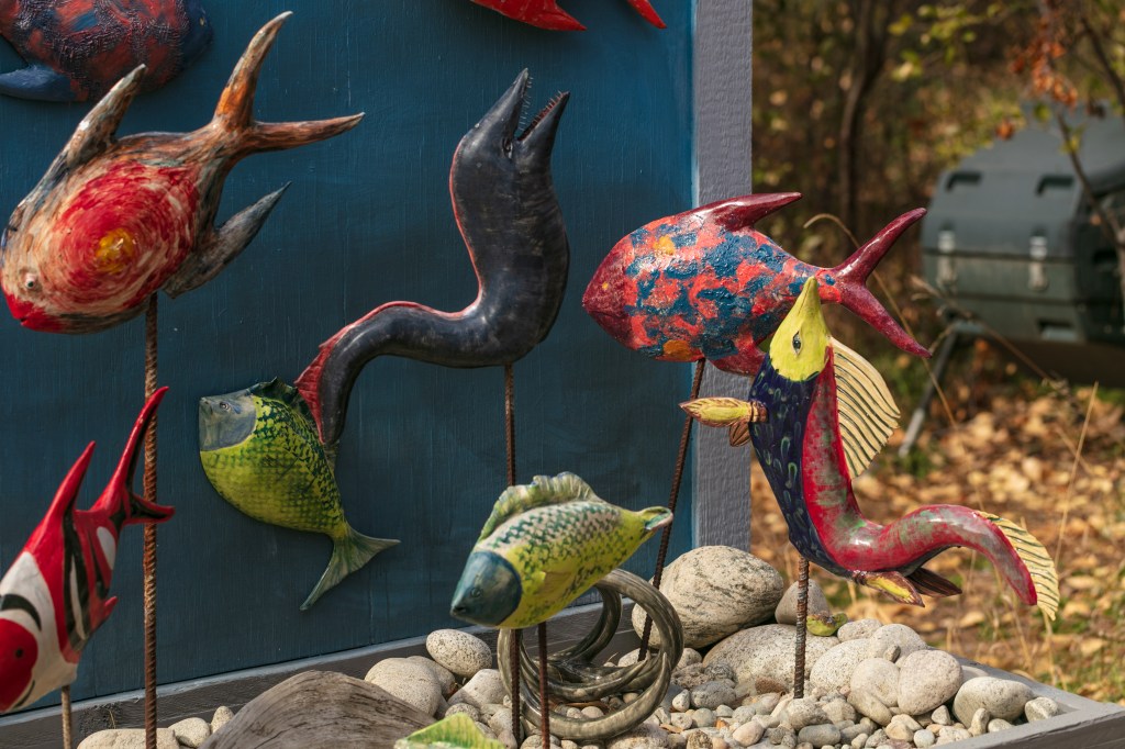 Fish sculptures in a garden