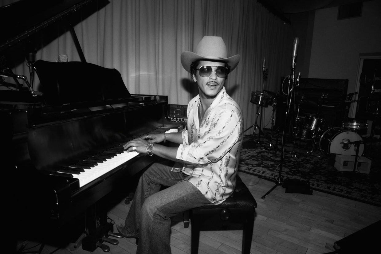 bruno Mars at a piano