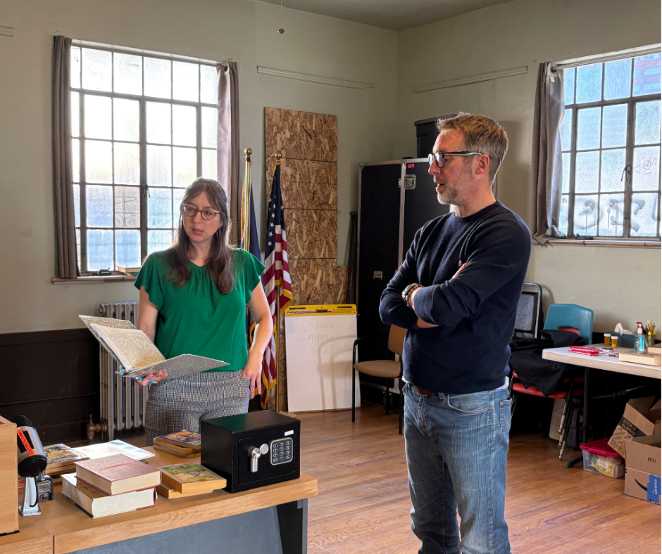 A woman and man are in a rehersal room
