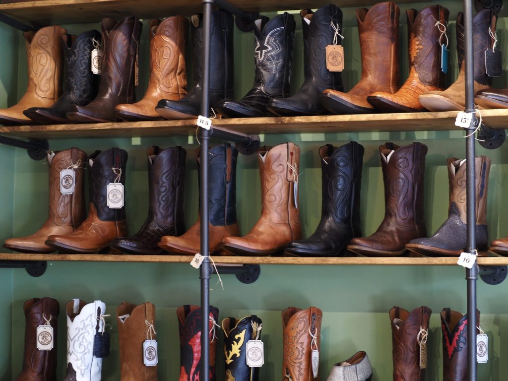 shelves of cowboy boots