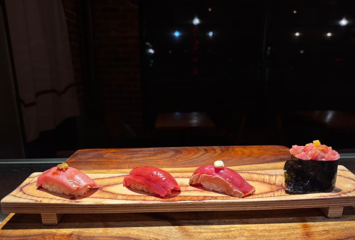 a tray of tuna sushi