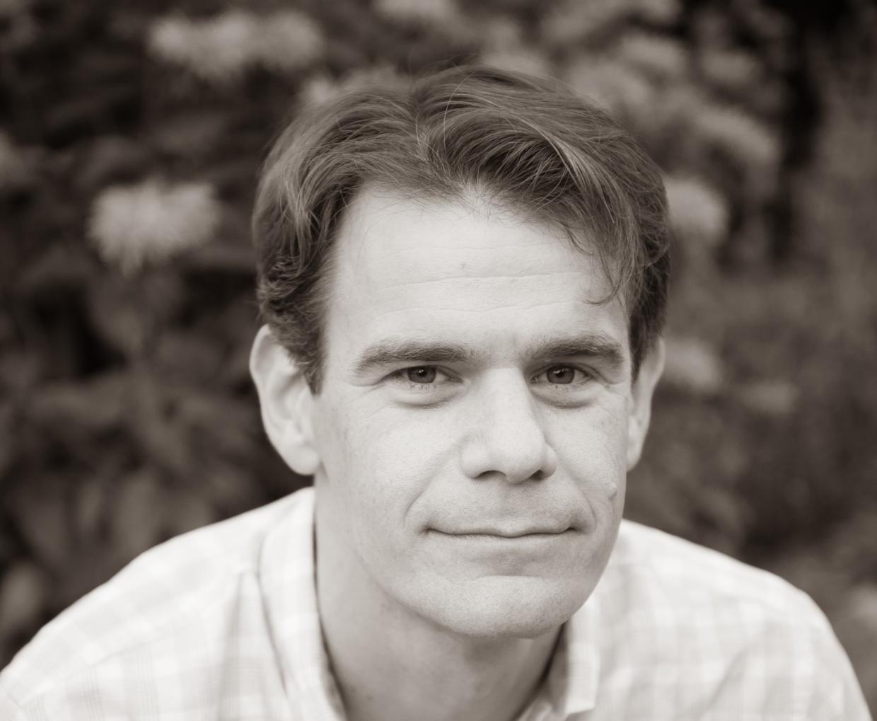 A headshot of a man