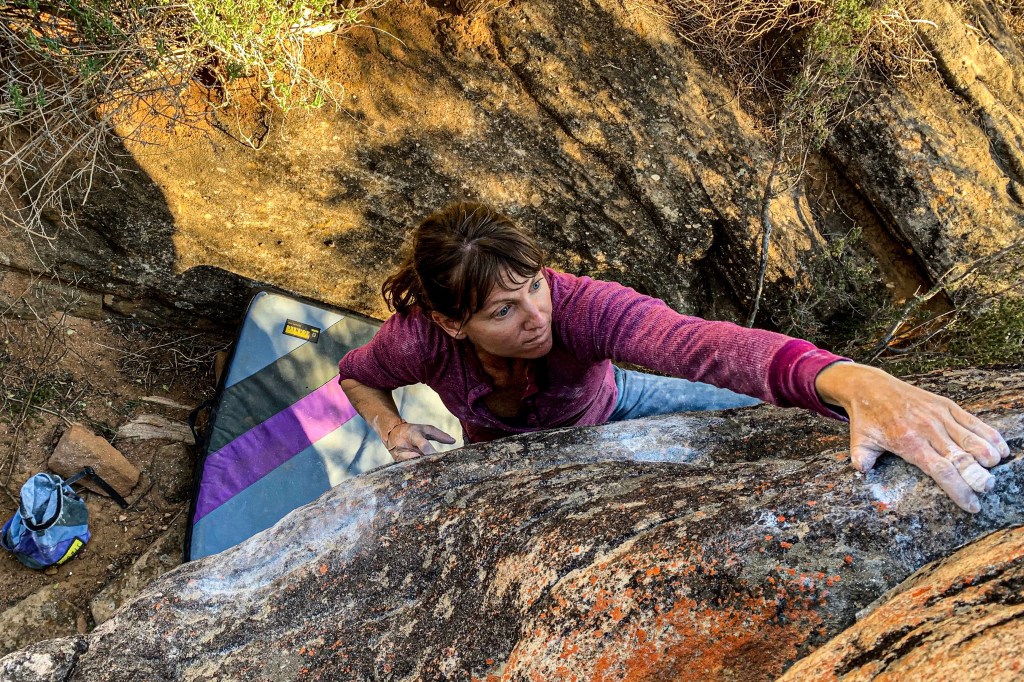 Strong bouldering with her new hands of varying finger lengths