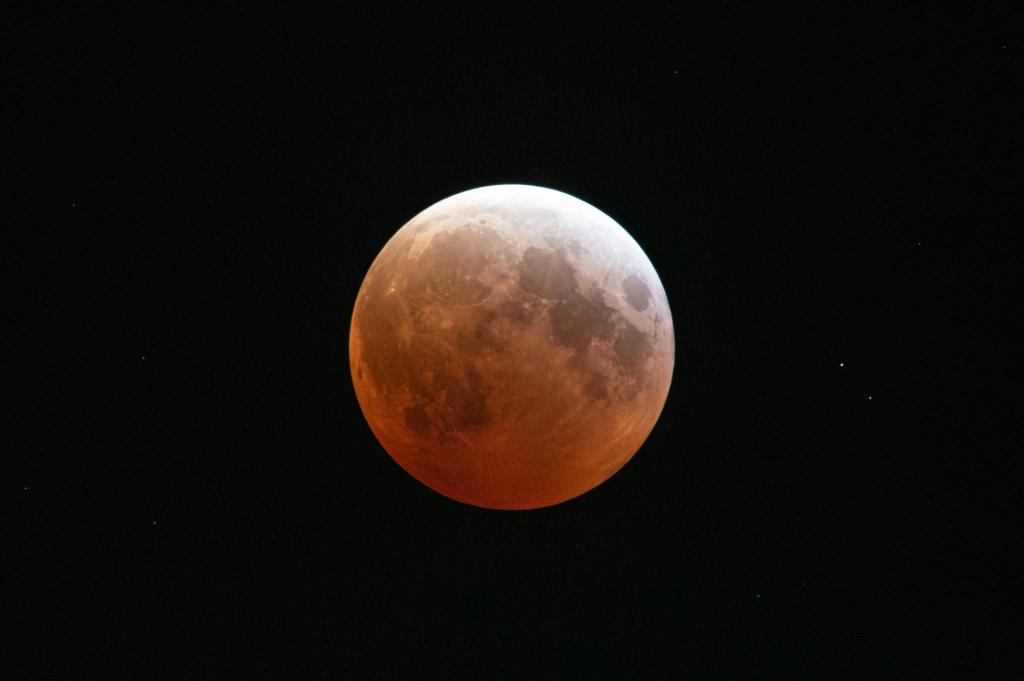 A full Blood Moon with a reddish hue