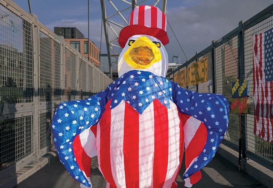 man in inflatable uncle same eagle costume