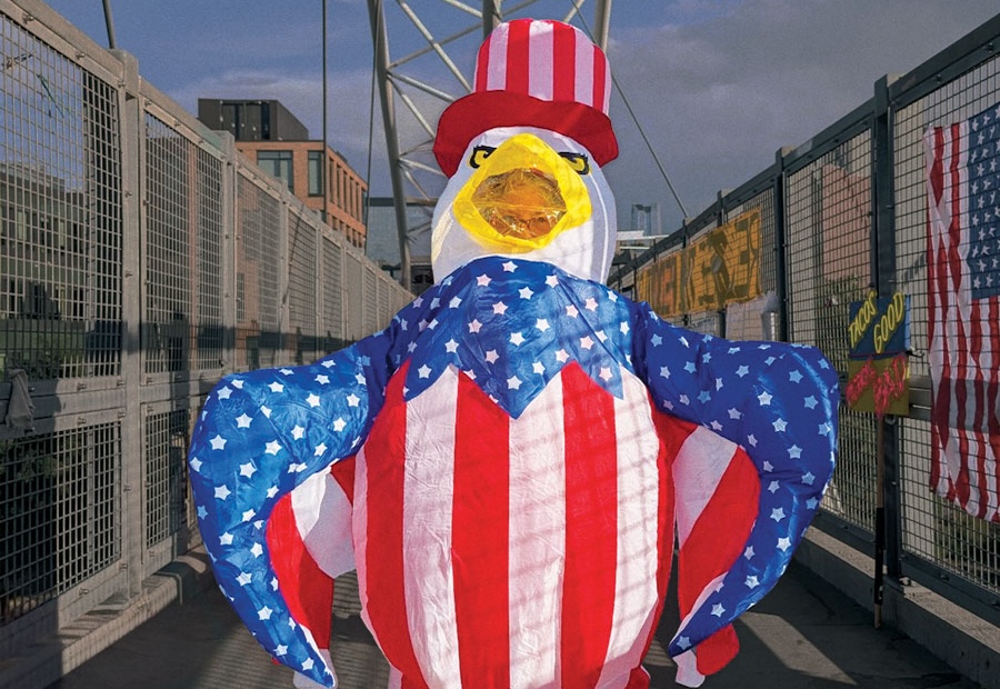 man in inflatable uncle same eagle costume