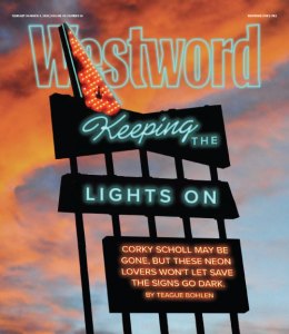 A neon sign reading "Keeping the Lights On"