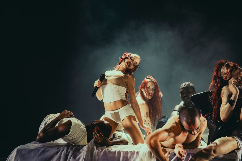 FKA Twigs on stage with additional stage performers at the Fillmore Auditorium in Denver, Colorado, on Monday, March 30.