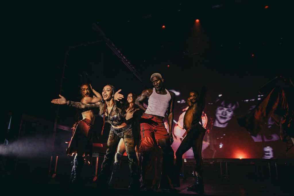 FKA Twigs on stage with additional stage performers at the Fillmore Auditorium in Denver, Colorado, on Monday, March 30.