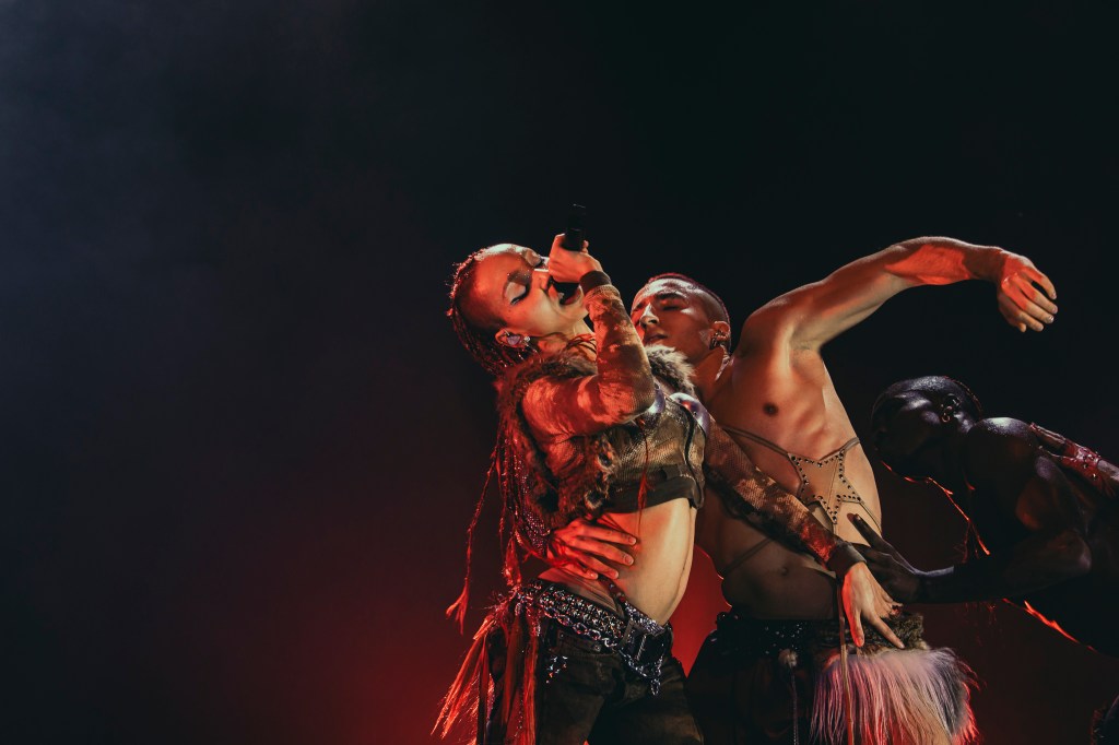 FKA Twigs on stage with additional stage performers at the Fillmore Auditorium in Denver, Colorado, on Monday, March 30.