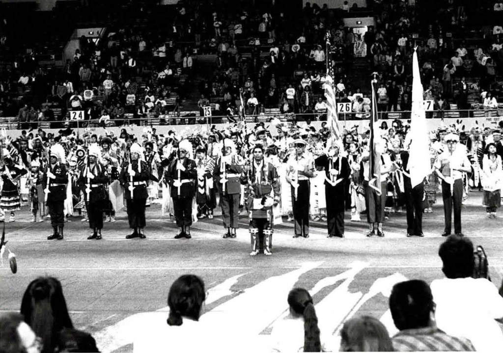 Native Americans perform a choreographed procession